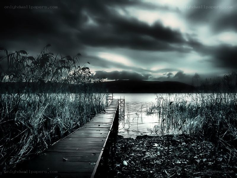 Dark dock at a lake