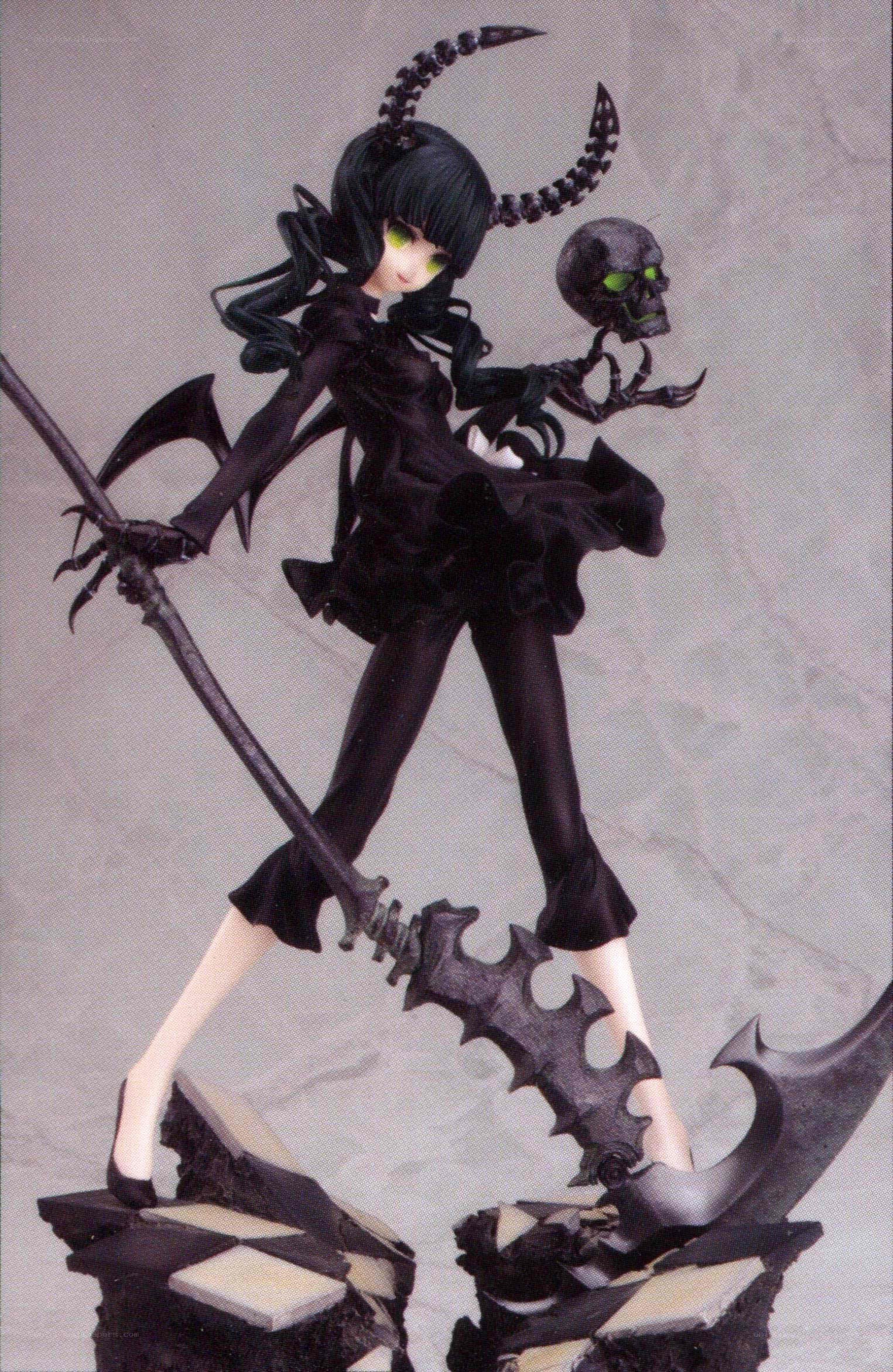 dark fantasy figurine with scythe