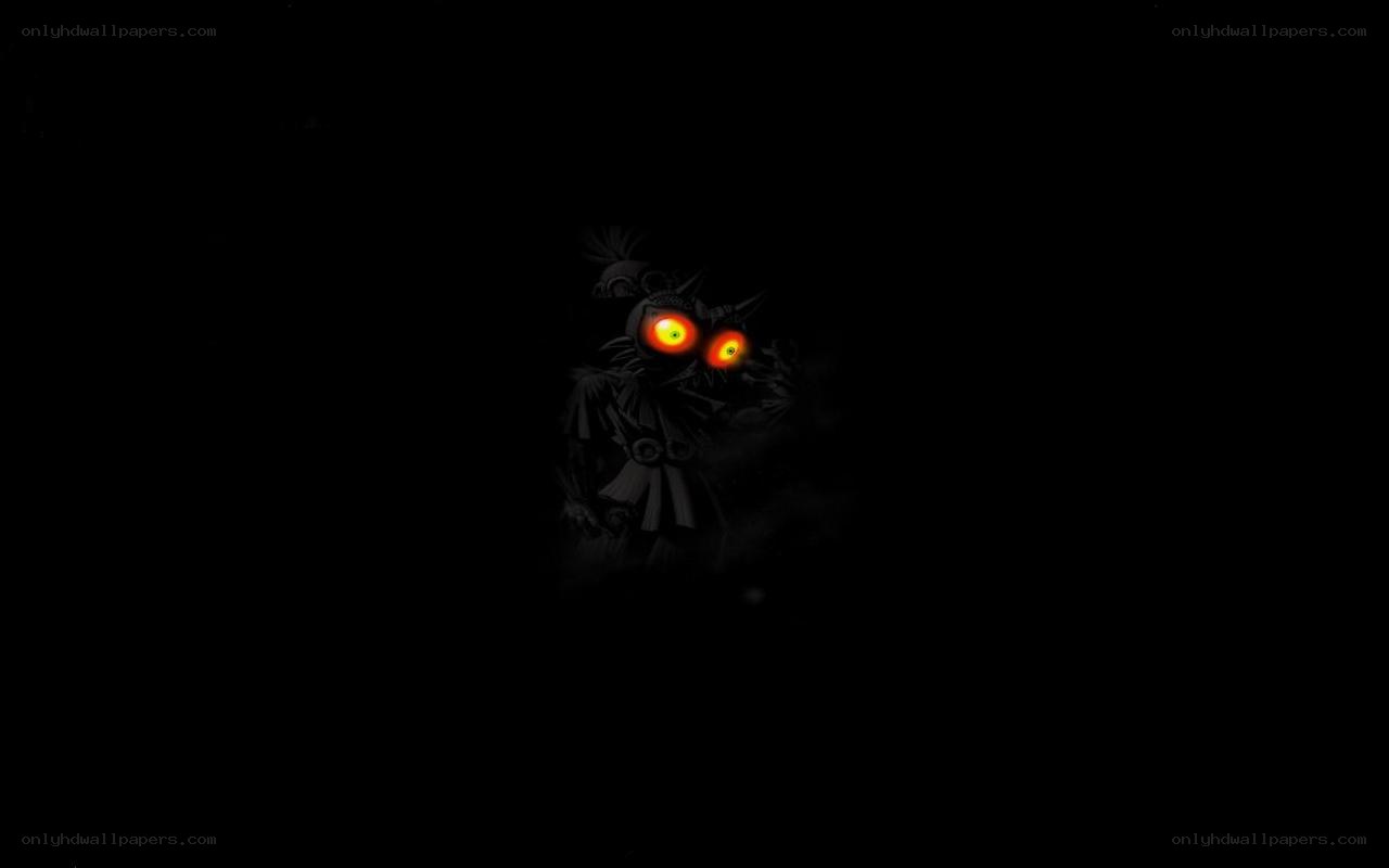 dark figure with glowing eyes
