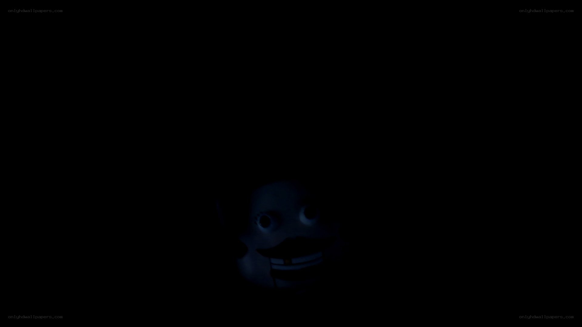 dark figure with glowing face