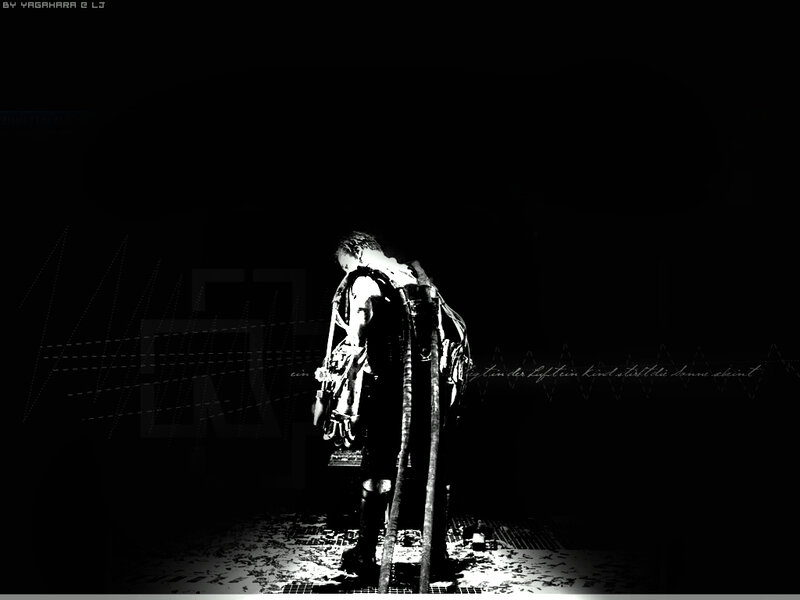 dark figure with guitar