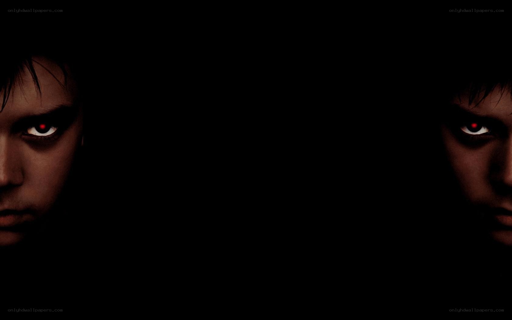 dark figure with red eyes