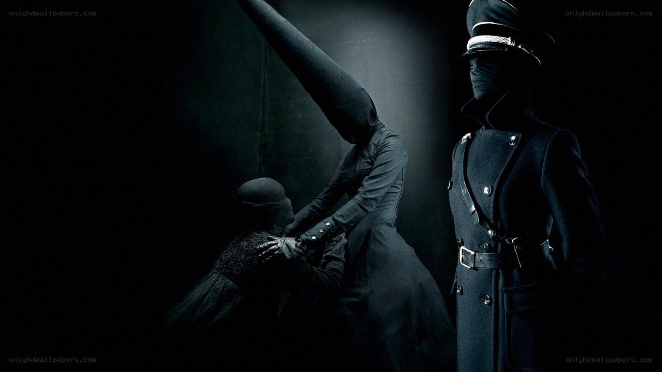 Dark figures in a dim room