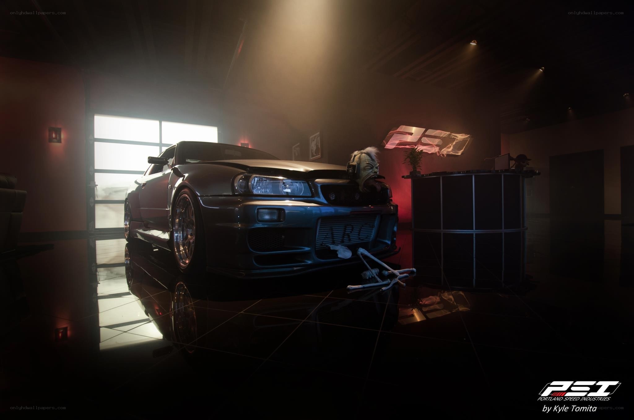 Dark garage with modified car