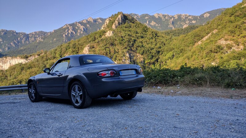 Dark Gray Convertible Car — Serene, Afternoon, Photograph