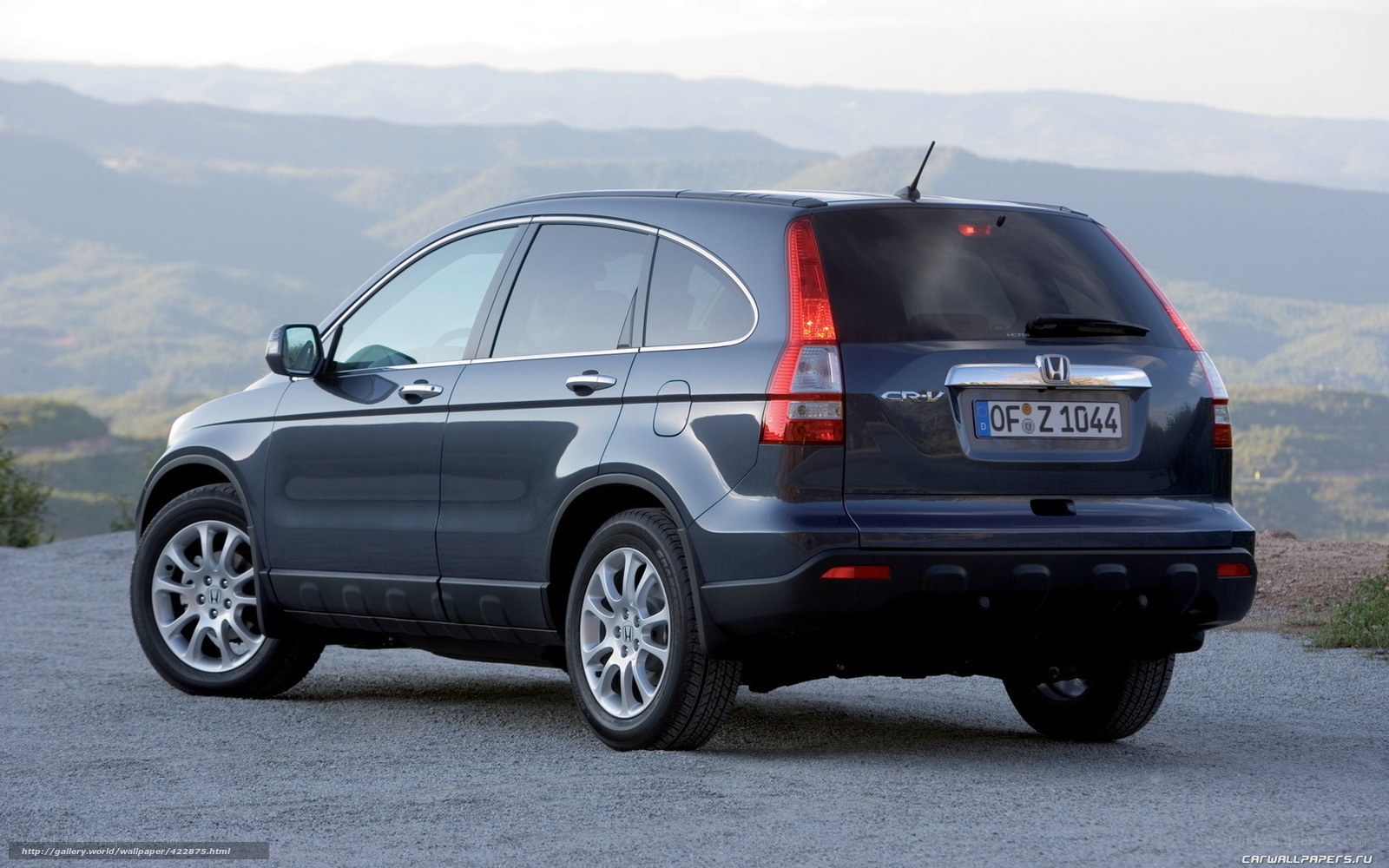 Dark gray Honda CR-V on a mountain road