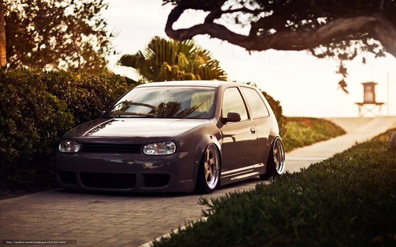 Dark gray modified car on a path