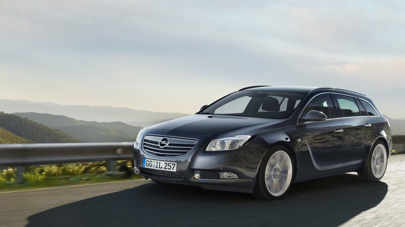dark gray opel in motion