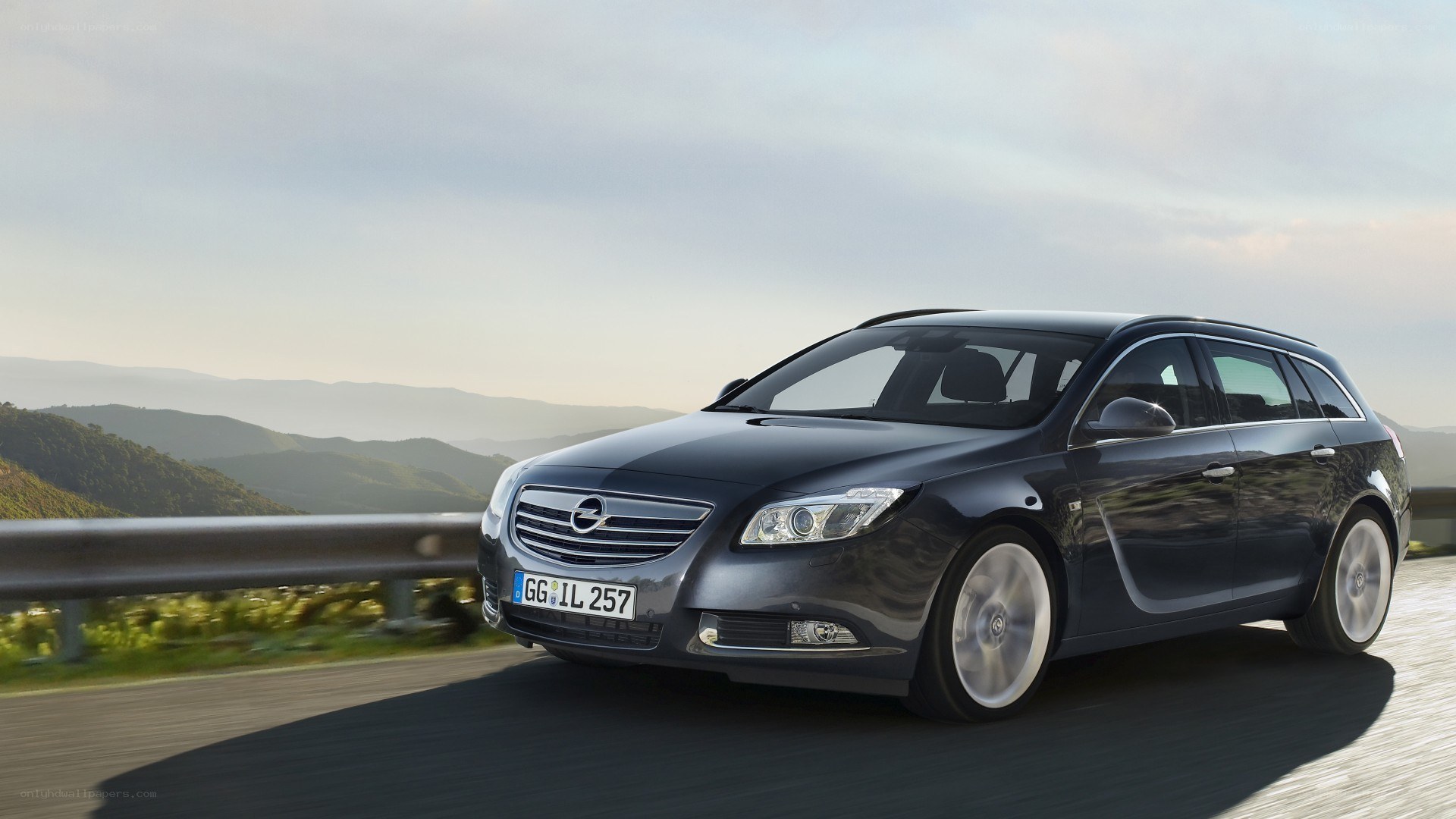 dark gray opel in motion