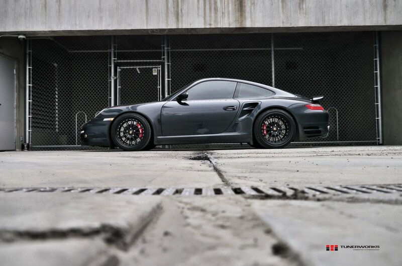 dark gray porsche in garage
