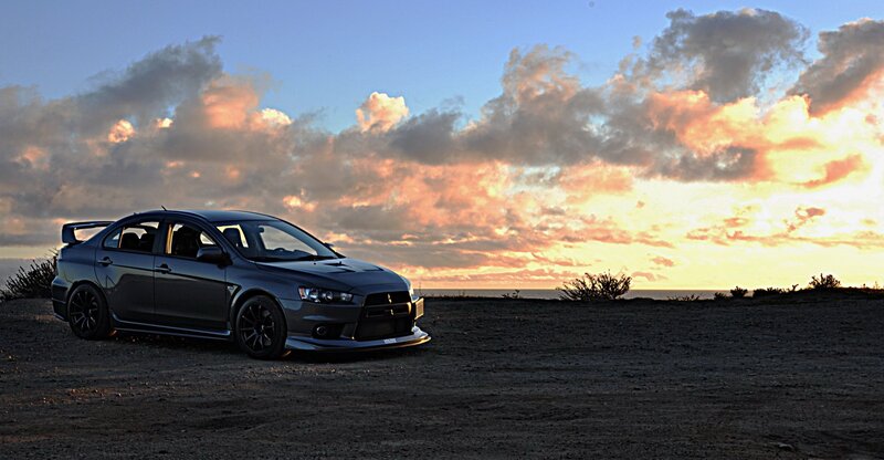 Dark Gray Sedan Car — Dramatic, Sunset, Photograph, Clouds