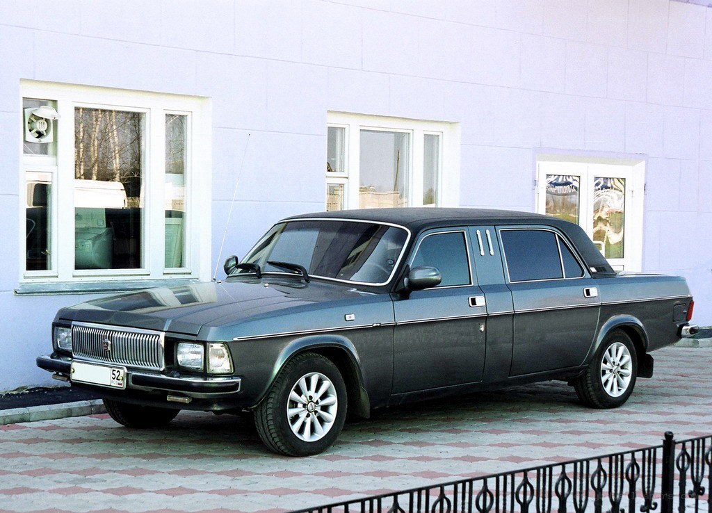 Dark gray sedan parked outside