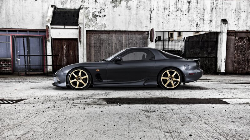 Dark Gray Sports Car — Dramatic, Photograph, Building, Concrete Ground