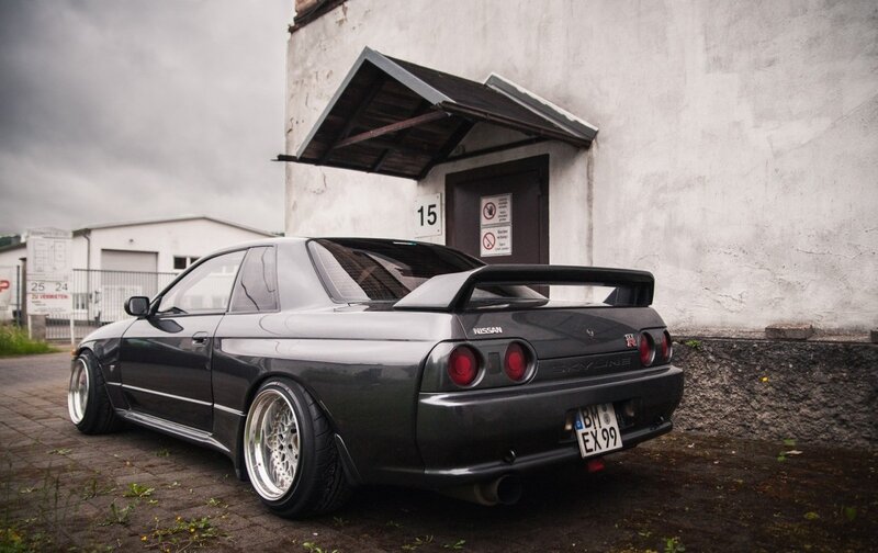 Dark Gray Sports Car — Dramatic, Photograph, Building, Door, Wheels
