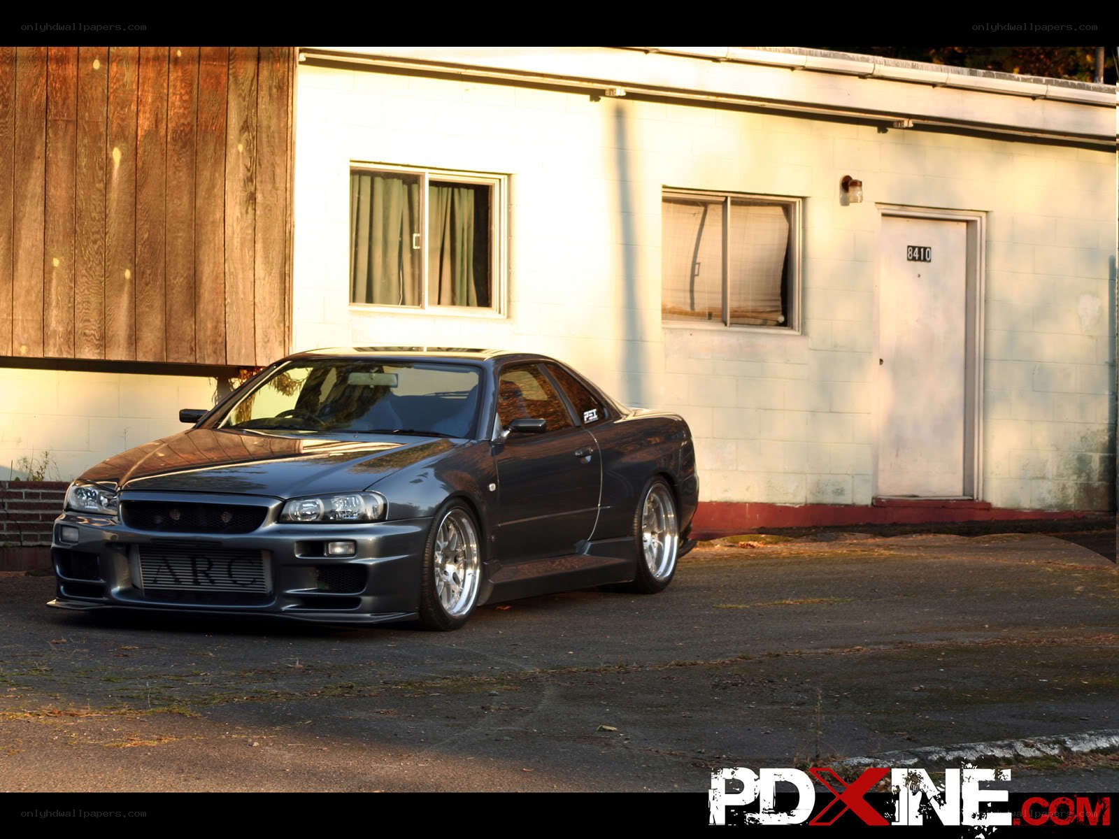dark gray sports car parked