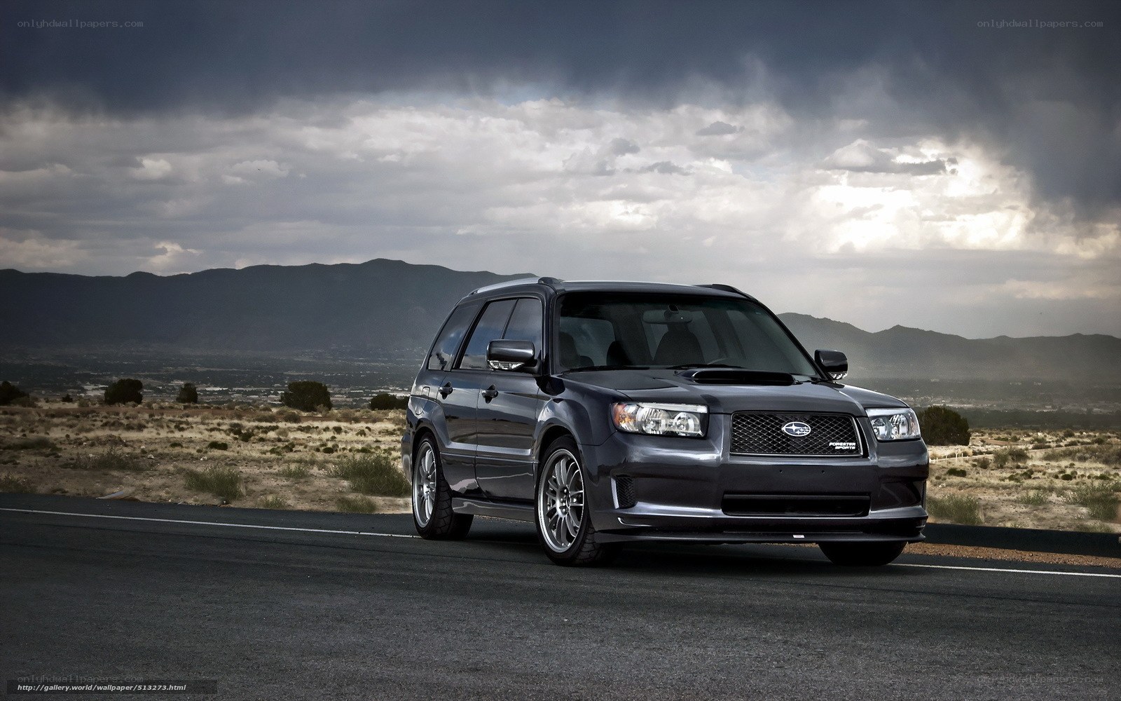 Dark gray Subaru Forester on a road