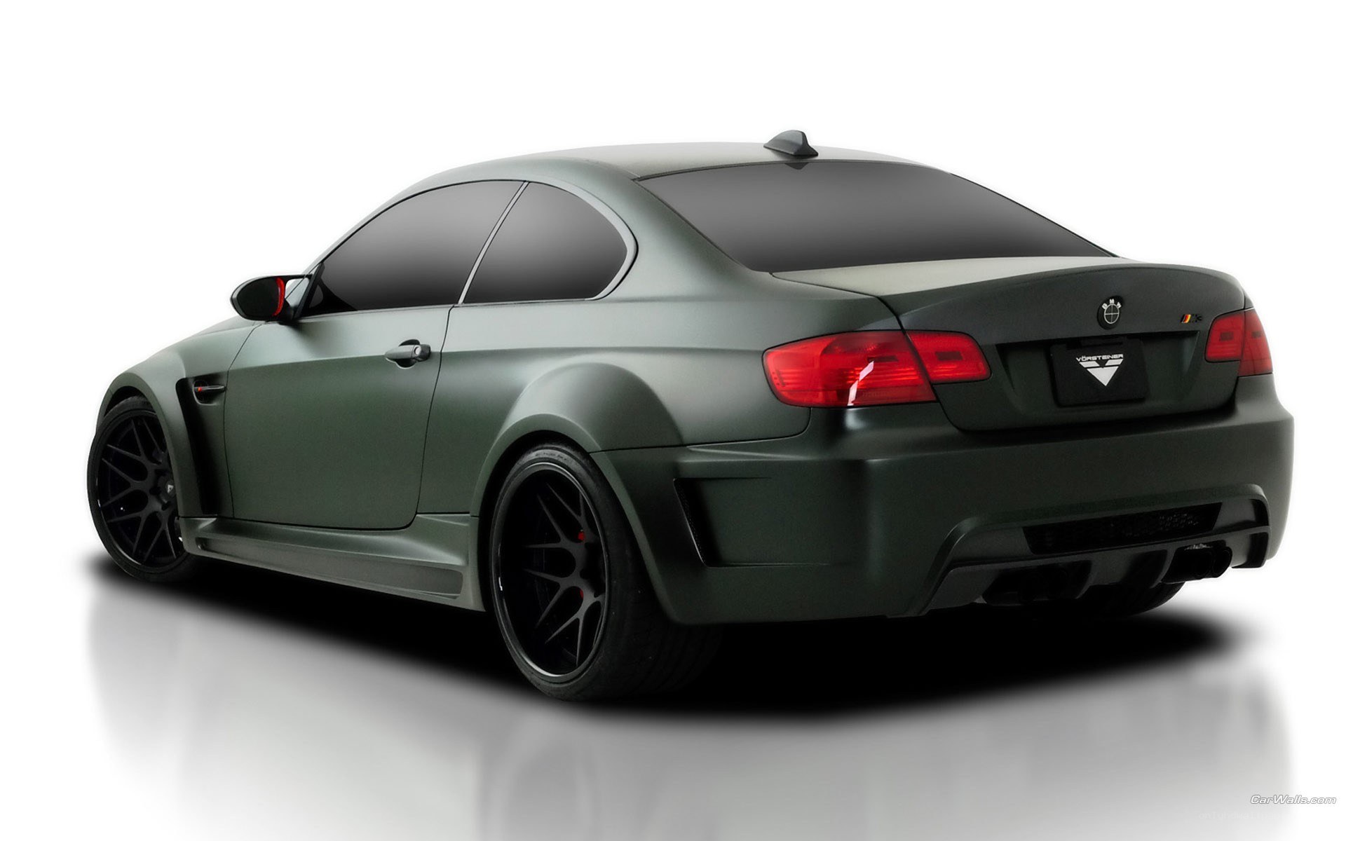 dark green BMW M3 coupe
