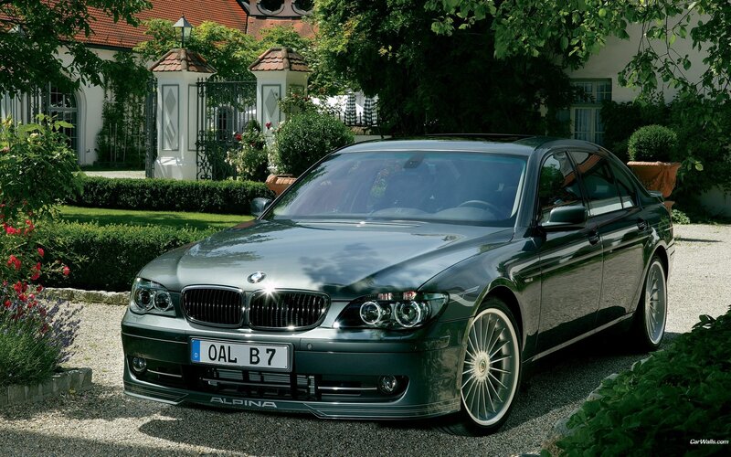 Dark Green Sedan Car — Serene, Afternoon, Photograph