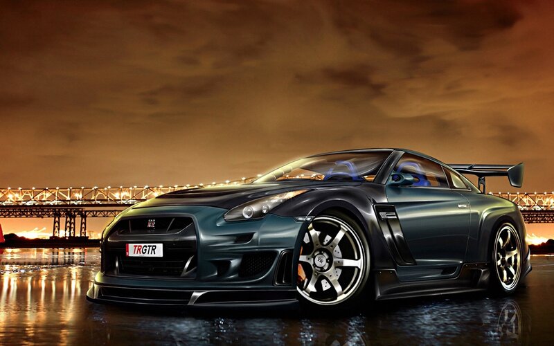 Dark green sports car at night