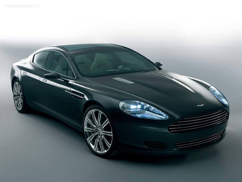 Dark Green Sports Car — Black, Neutral, Photograph, Headlights