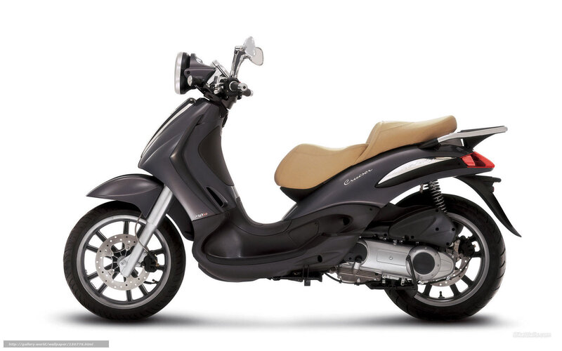 dark grey scooter with tan seat