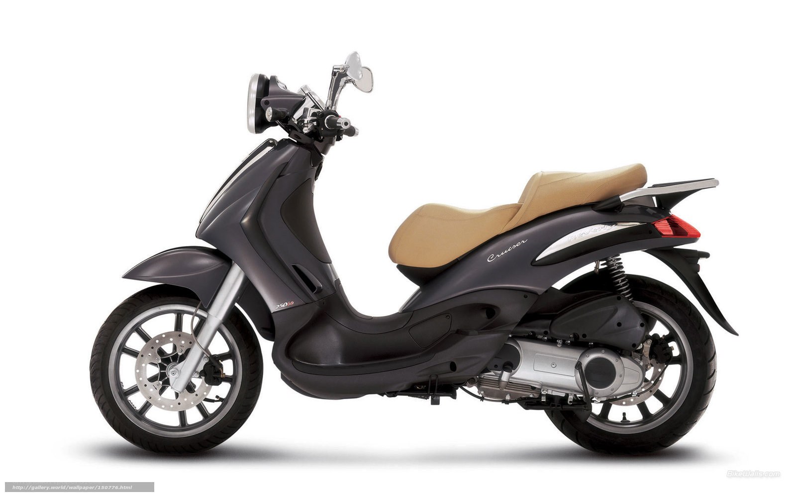 dark grey scooter with tan seat