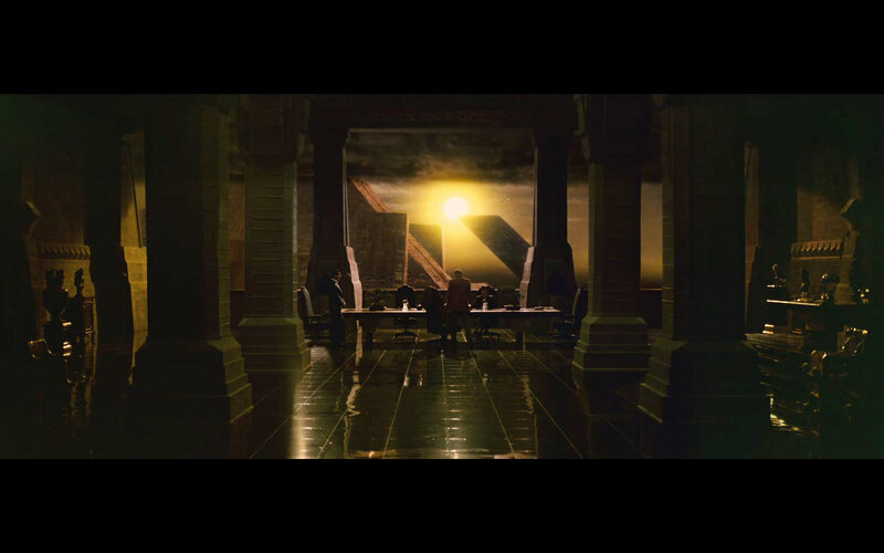 dark hall with pyramid backdrop