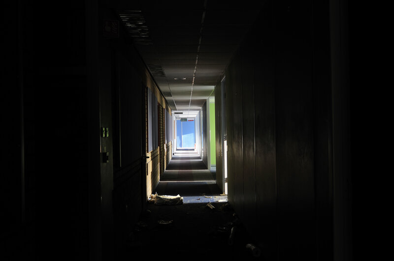 dark hallway leading to light