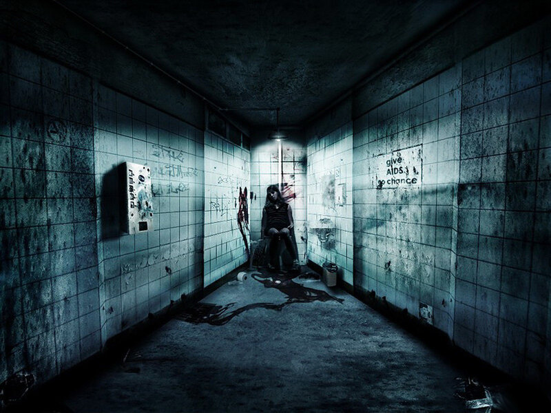 dark hallway with graffiti