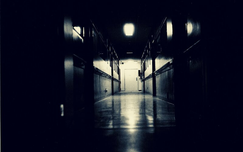 dark hallway with light at end