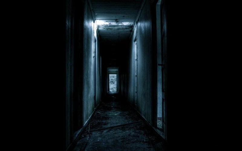 dark hallway with light at end