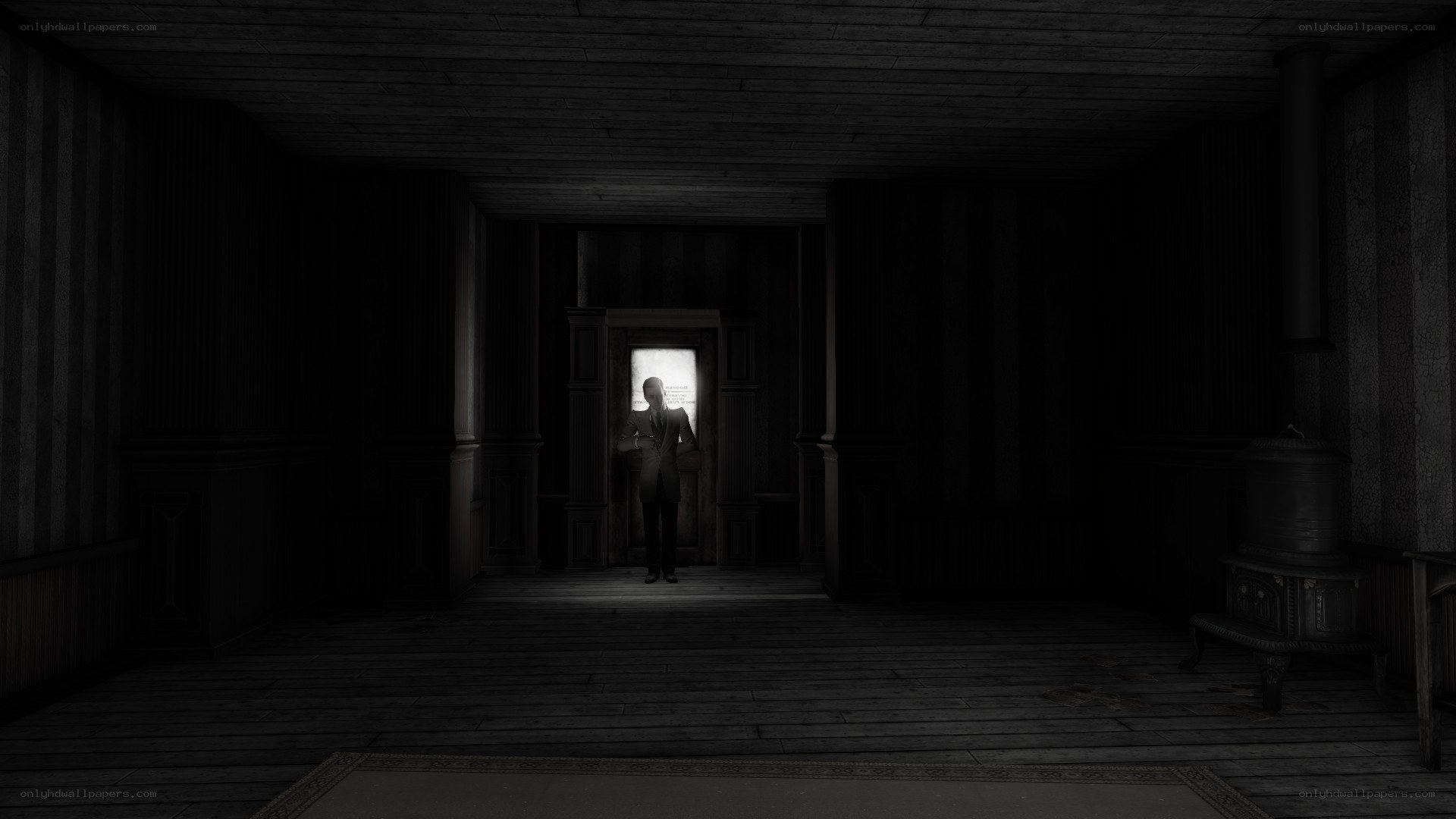 dark hallway with silhouetted figure