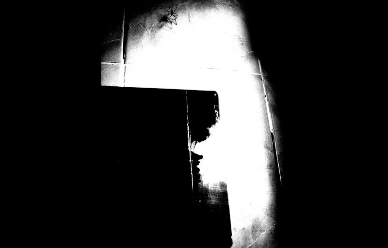 dark hallway with spider