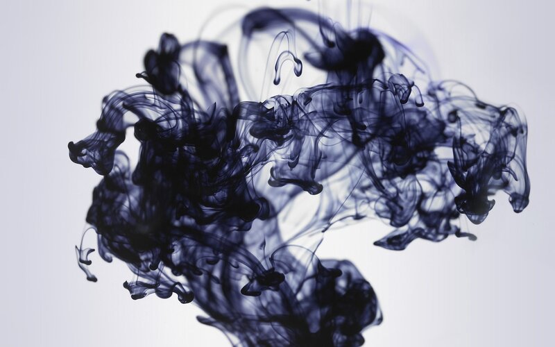 dark ink swirling in water