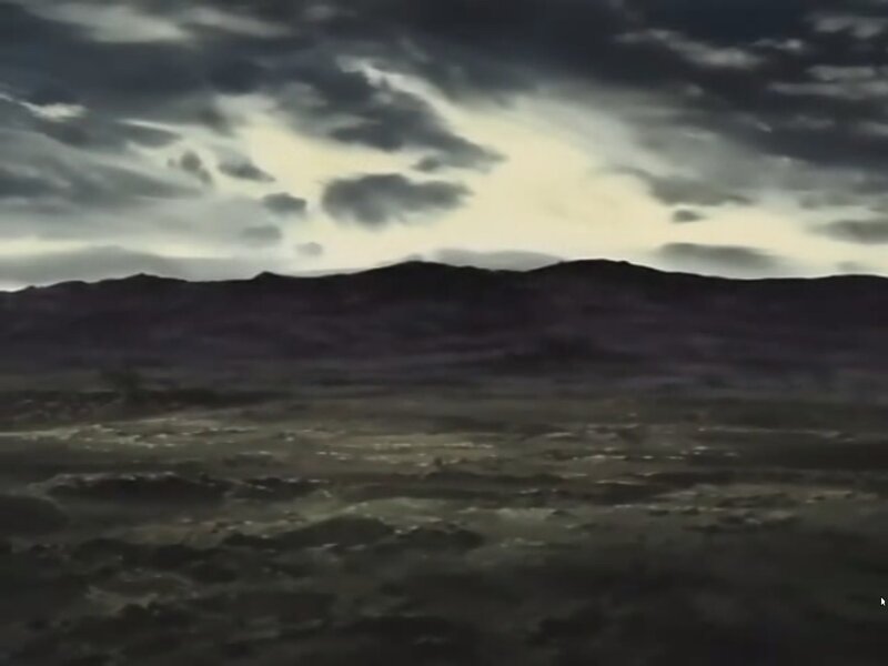 dark landscape under stormy sky