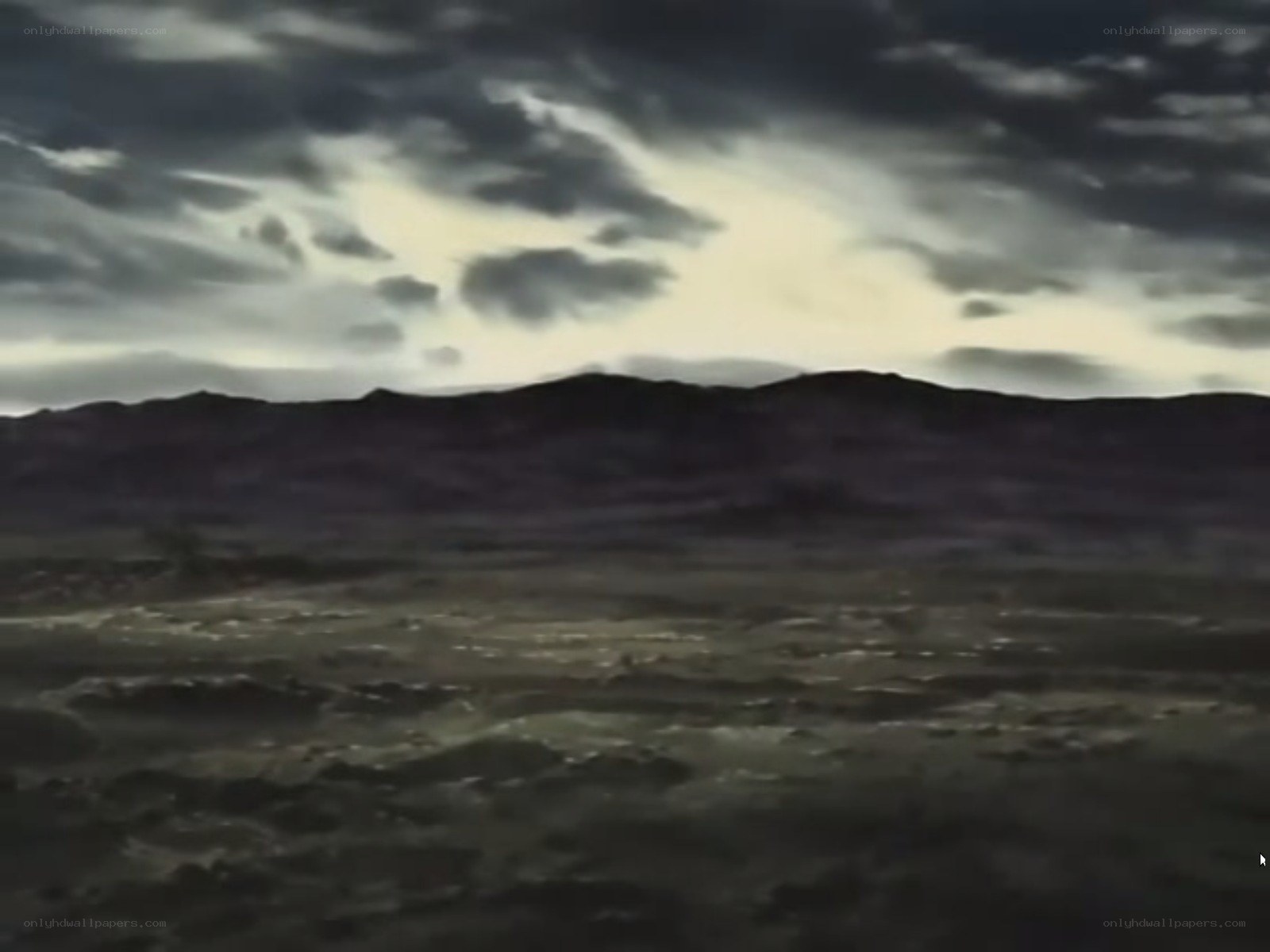dark landscape under stormy sky