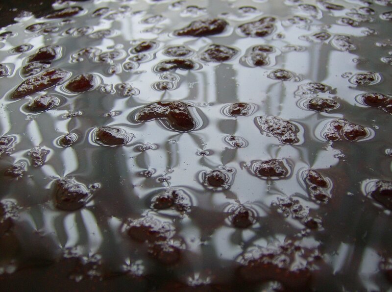 dark liquid with bubbles