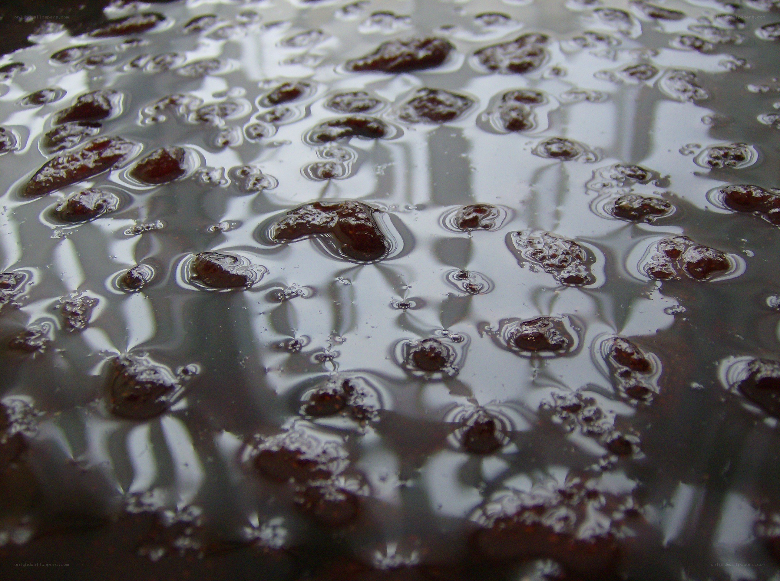 dark liquid with bubbles