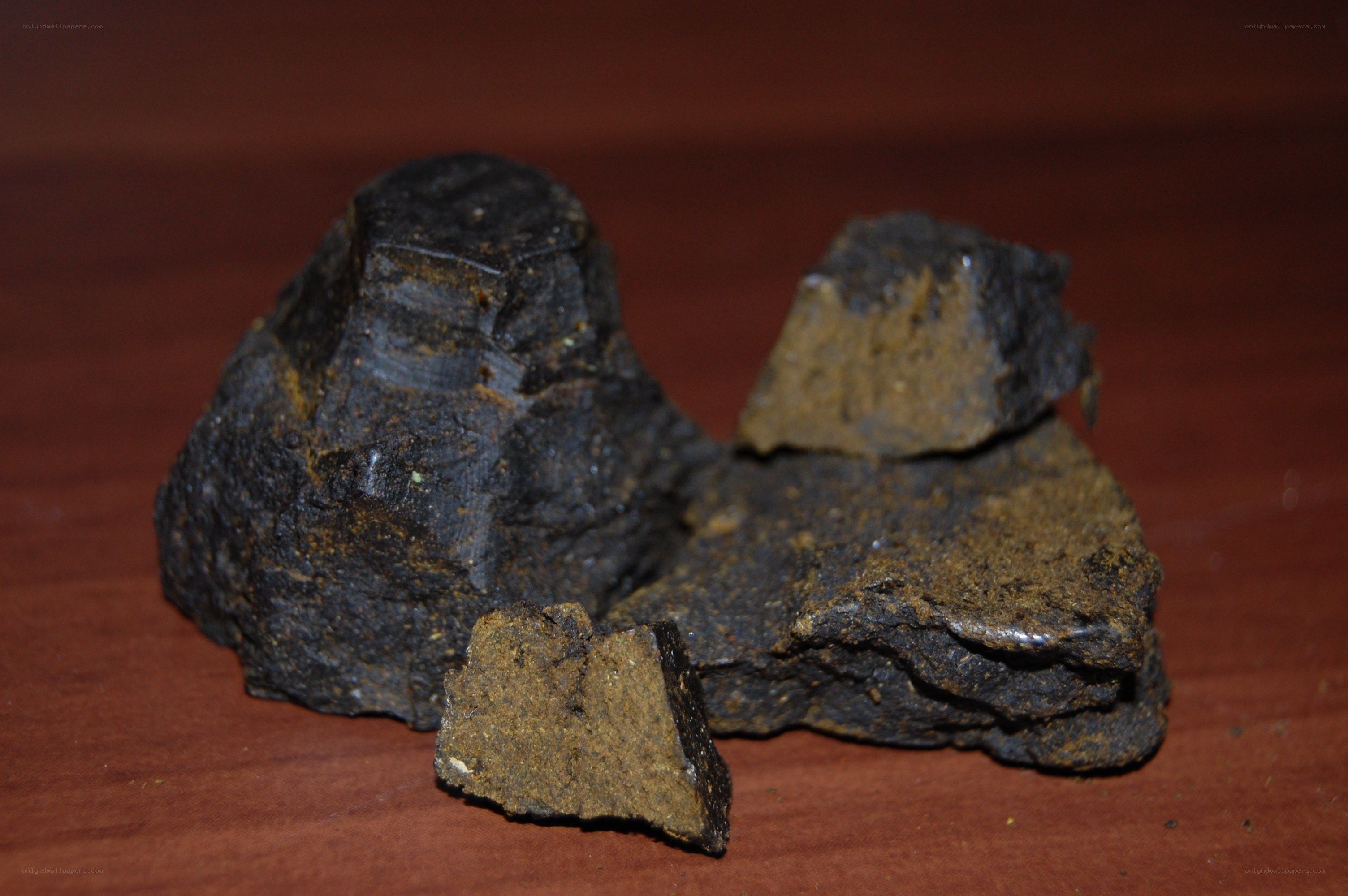 dark mineral fragments