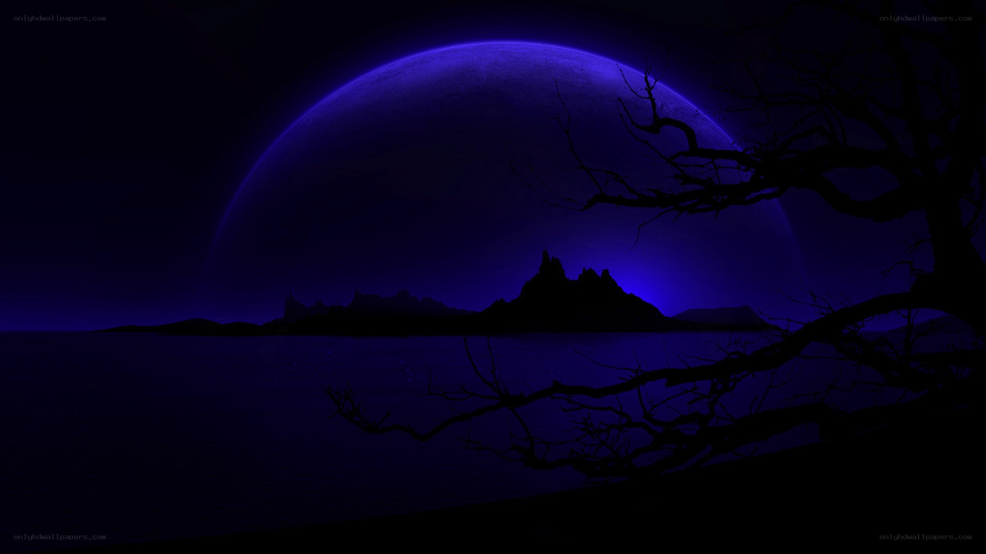 Dark moon over alien landscape