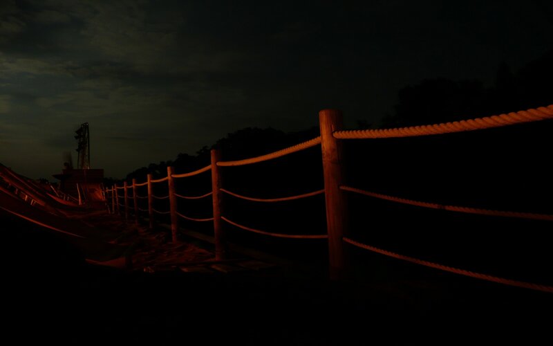 Dark night with rope fence