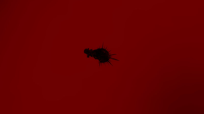 dark object on red background