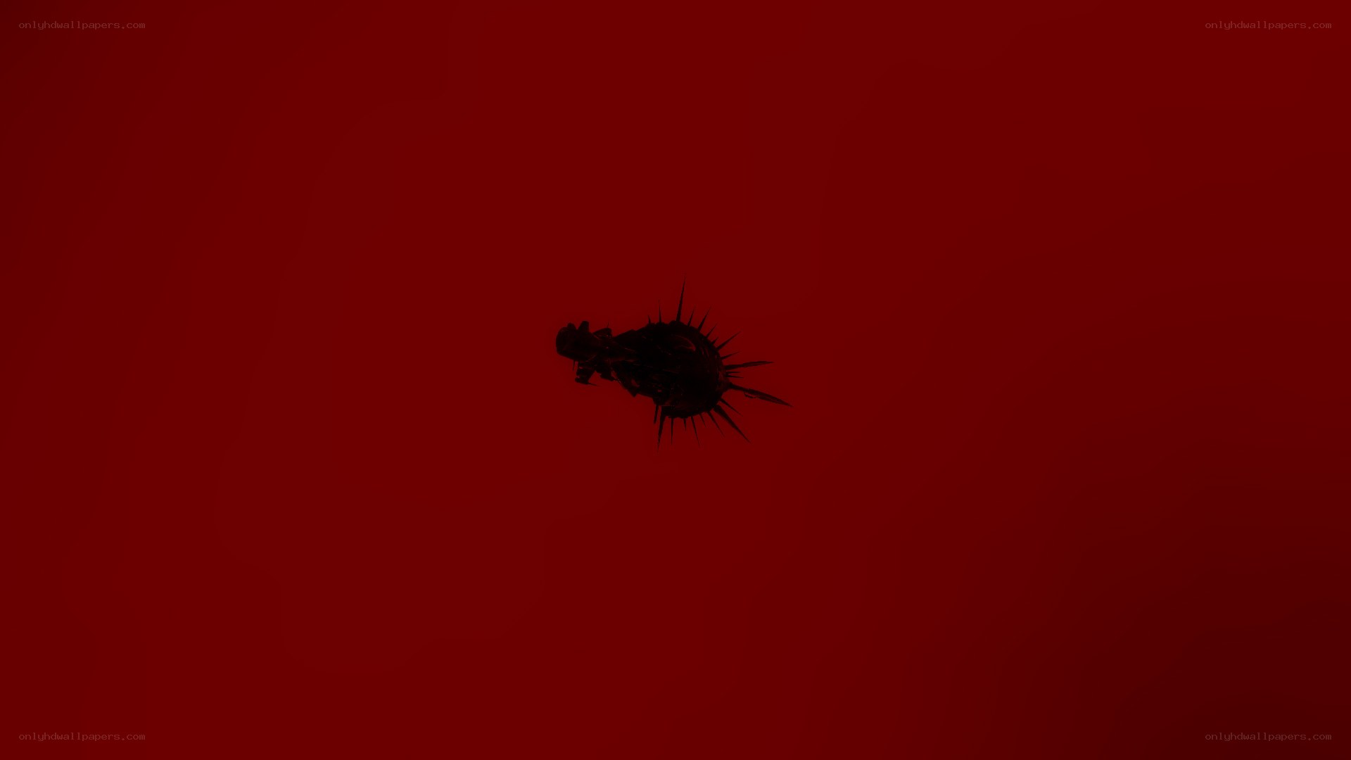 dark object on red background
