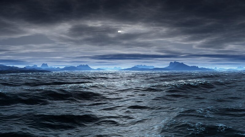 Dark ocean under cloudy sky