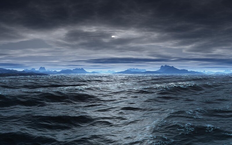 Dark ocean under cloudy sky