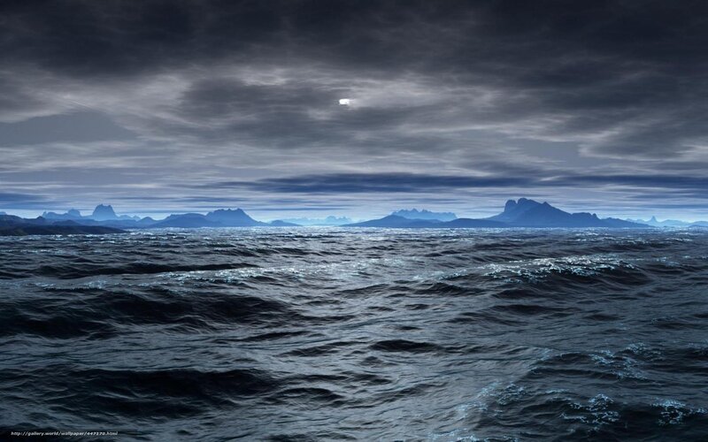 Dark ocean under cloudy sky