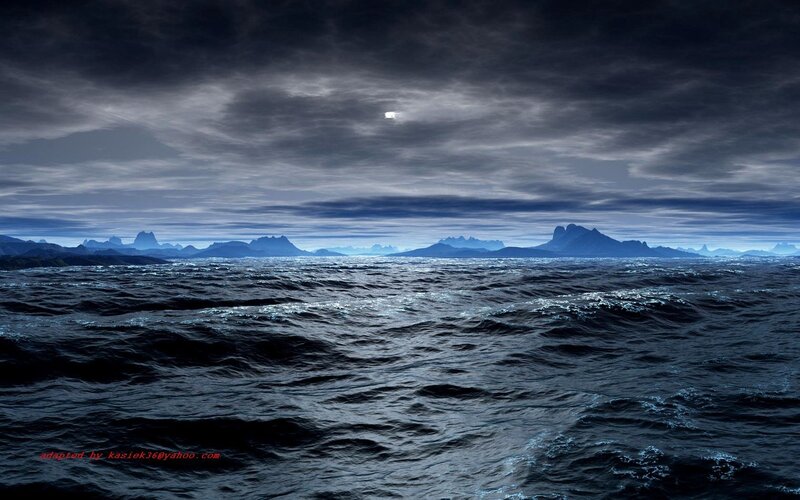Dark ocean under moonlit sky