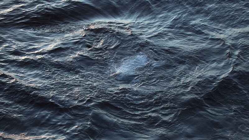 dark ocean waves at dusk