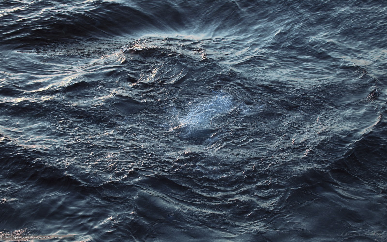 dark ocean waves at dusk