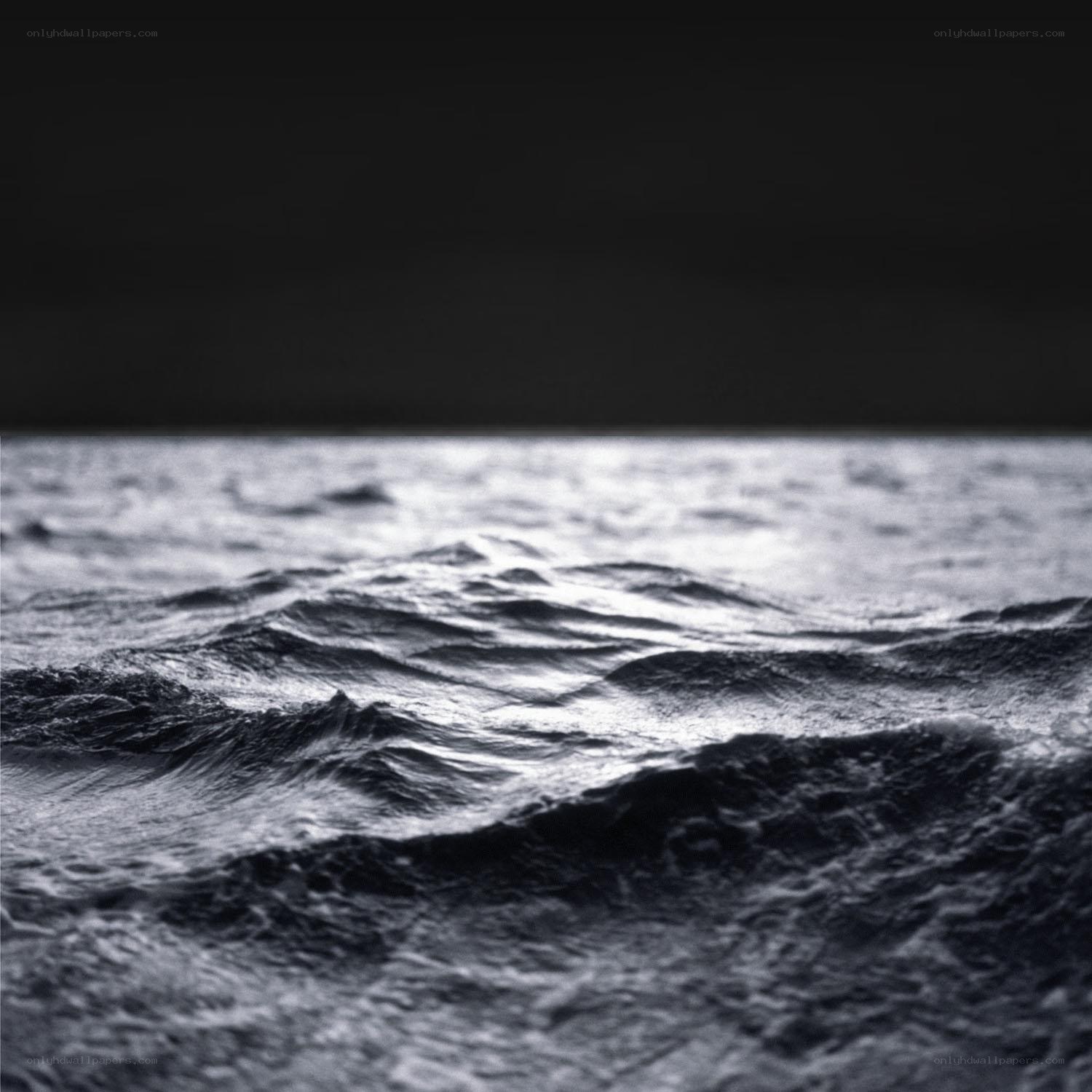 Dark ocean waves at night